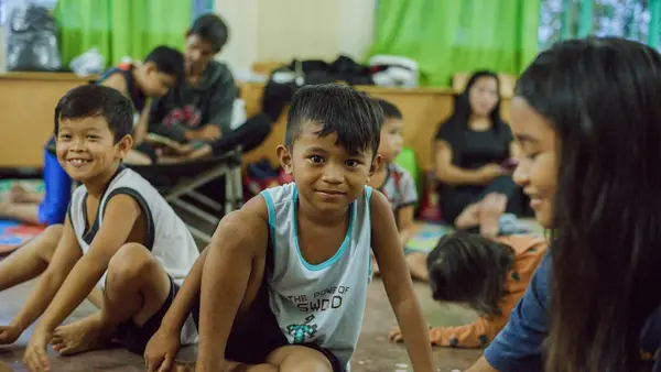 Ian, 7, shelters at Reserva Elementary School with his family in Baler, Aurora, the Philippines as the province braces for the impact of Super Typhoon Uwan (Fung-wong)