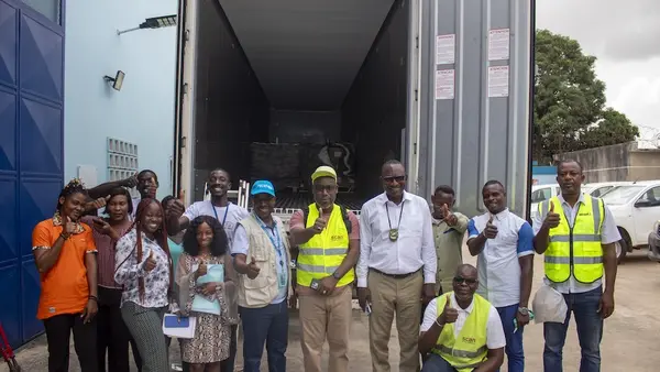 UNICEF staff celebrate the delivery of a shipment of vaccines by sea to Abidjan, Côte d'Ivoire in 2025.