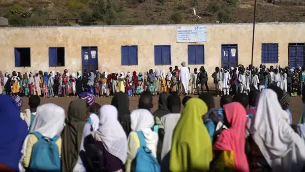 Students gather outside a UNICEF-supported school in Rokero, Central Darfur, Sudan.