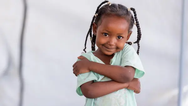 A 3 year old girl attends learning and play sessions at a Safe Learning Space in West Darfur, Sudan, supported by UNICEF.