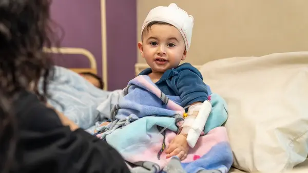 At a hospital in Beirut on April 9, 2026, a 10-month-old baby is treated for injuries sustained during an Israeli air strike.