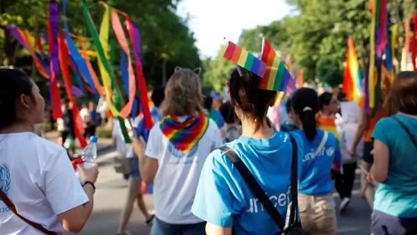 UNICEF representatives participate in a Pride march in Vietnam.