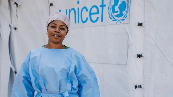 UNICEF-supported psychologist outside an Ebola Treatment Center in Bunia, DR Congo.