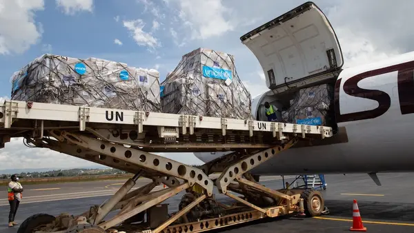 A plane filled with emergency supplies to support Ebola outbreak response arrives in the DRC.