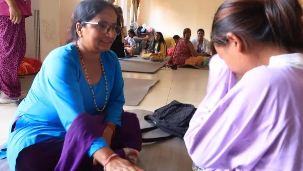 In Nuwakot district, a UNICEF-supported counselor consoles a girl coping with grief and fear after massive flooding swept across Nepal. 