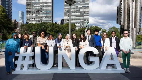 UNICEF Youth Advocates pose together for a photo outside UN Headquarters in New York before the 2024 General Assembly. © UNICEF /  UNI647568 / Tadej Znidarcic