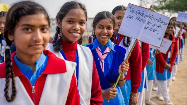 Girls in India advocate against child marriage.