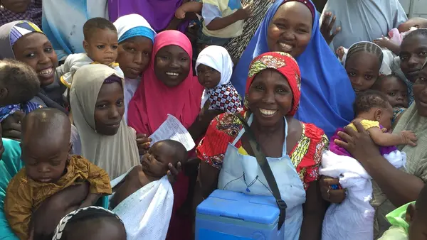polio vaccinator Aisha Bulama in Maiduguri Metropolitan Council, Borno State, Nigeria. As a polio vaccinator, Aisha is a key member of one of thousands of UNICEF-supported polio vaccination teams who began immunizing children against polio