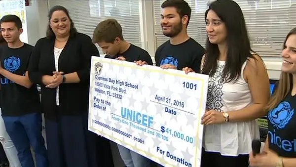 Cypress Bay Highschool Gives Check to UNICEF