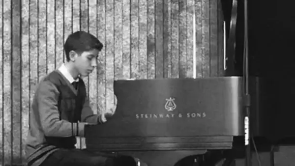 Person Playing Piano