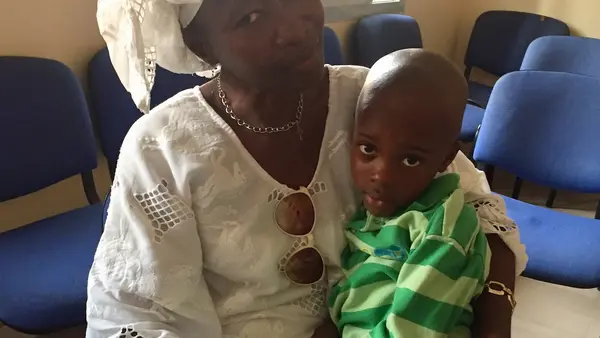 Woman holding Child