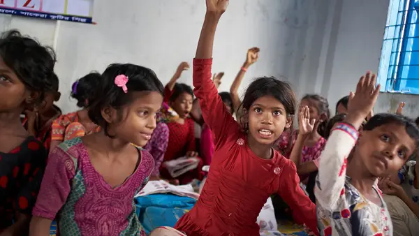 Eight-year-old Rohingya refugee Yasmin and other students at the "Prajapatti" (Butterfly) UNICEF learning center in the Kutupalong makeshift refugee settlement in Cox's Bazar, Bangladesh.