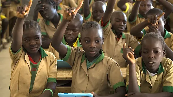 School Children Raising Hands