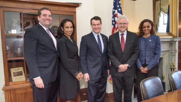 Semhar Araia (far right) meets with Sen. Todd Young (R-IN) (middle) to underscore the importance of diasporas 