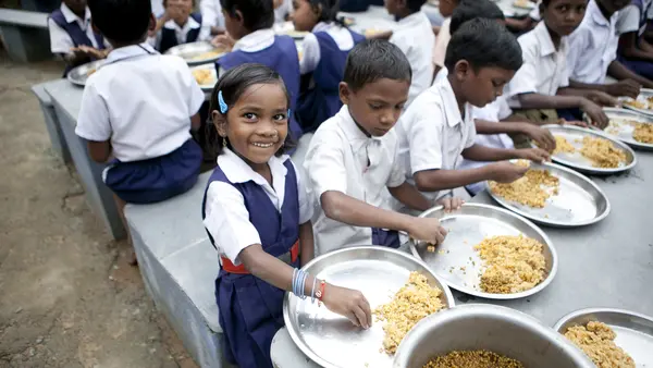 Children in India enjoying a meal at school