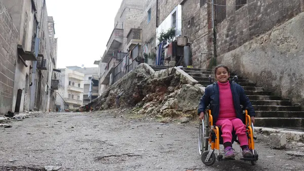After Hanaa, 8, was paralyzed by an exploding bomb in Aleppo, Syria, volunteers at a UNICEF-supported Child Friendly Space helped her get back to learning and playing.