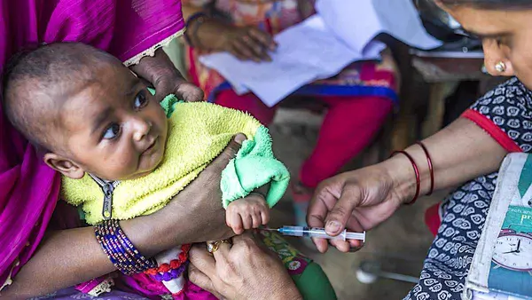 A baby gets vaccinated in Vijaynagar Ghaziabad, India.