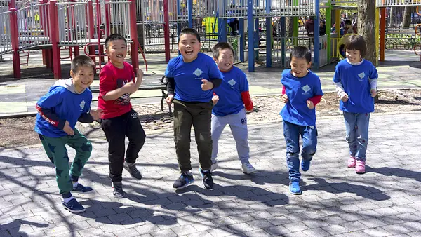 Students of P.S. 42 in New York City challenge each other to a running race to earn more Kid Power points.