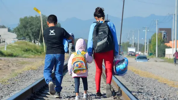 Fleeing violence in Honduras, a 16-year-old girl and her younger siblings hope to be reunited with family members in the U.S.  