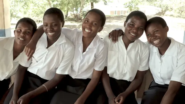 The K.I.N.D. Fund, a partnership between UNICEF and MSNBC's Lawrence O'Donnell, provides scholarships to students in Malawi like Rehema, far right.