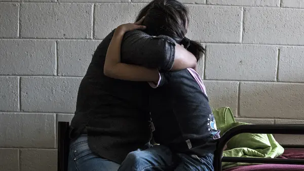 Two People Hugging
