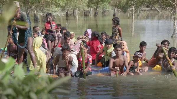 Children on a Raft in Water