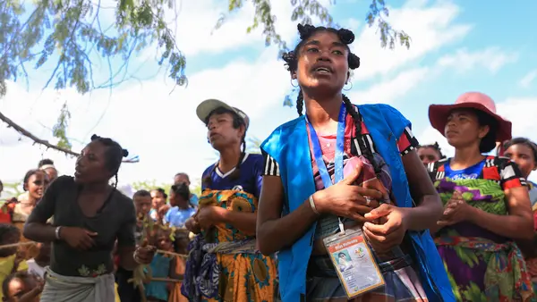 UNICEF-trained Mother Leaders sing an educational song during a celebration in Tanandava, Madagascar in 2019.