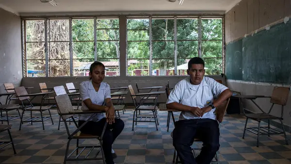 Josseline, 17 (left), Darwin, 16, and their friend Henry were targetted by bullies in Villanueva, Honduras. Henry committed suicide. 