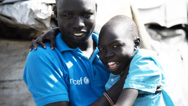 Caseworker Simon Char is checking up on 11-year-old Diech Gwang in the Protecion of the Civilian (PoC) site in Malakal, South Sudan. He has been separated from his family for four years and Simon is trying to find out if his parents are alive. 