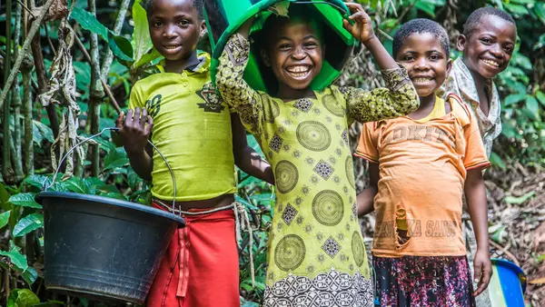 Children clown around while collecting water at a UNICEF-built pumping and distribution station near Kananga, Democratic Republic of Congo, in October 2018.