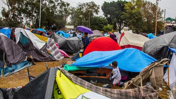 Families migrating from Central America to the U.S. set up makeshift camps in Tijuana, Mexico. 