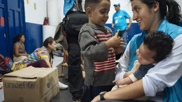 On April 24, 2019 in Cucuta, Colombia, UNICEF Communication for Development specialist Andrea de la Torre talks to children who recently arrived from Venezuela. 