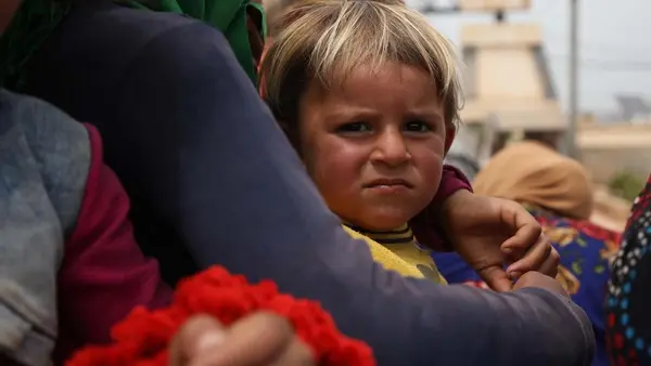 On May 5, 2019 in Atmeh, close to the Turkish border with Syria, trucks carrying families fleeing escalating violence in Idlib. 