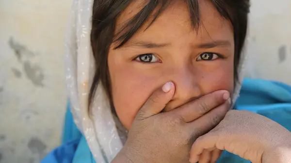 After 40 years of conflict, generations of children in Afghanistan — like this girl photographed in Daykundi Province in October 2019 — have no memory of peace. 