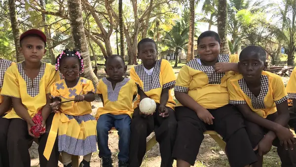 Group of Kids Smile at the Camera