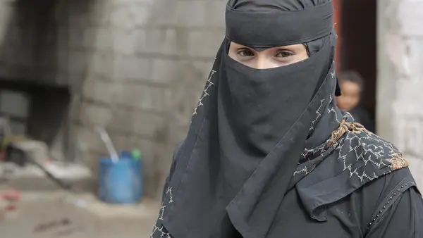 Amina was forced into early marriage at age 16. After being abused by her much older husband, she eventually returned to her parents' home in Aden, Yemen. She now runs a small business with skills she learned in a UNICEF-supported program.