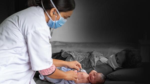 Medical Professional Treats Baby