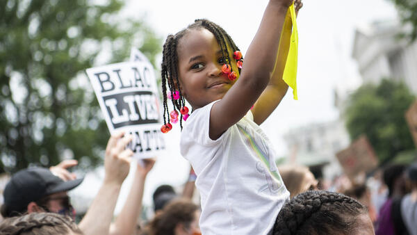 Demonstrators are seen on Constitution Avenue while marching to Freedom Plaza from Capitol Hill to honor George Floyd and all victims of racial injustice on Saturday, June 6, 2020. 