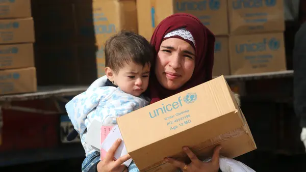 Woman and Child with a UNICEF Box