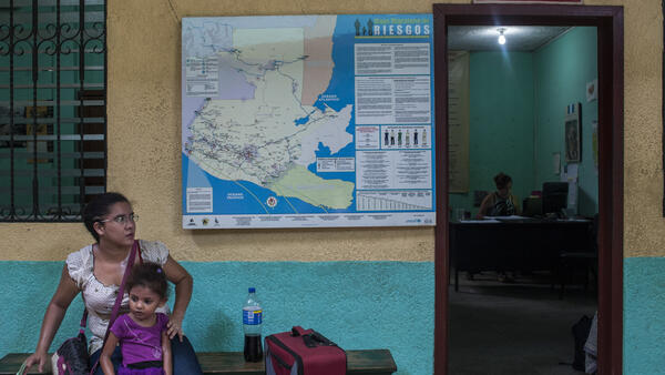 Woman and Child Outside Doorway