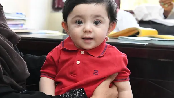 Nine-month-old Mubashir waits to be vaccinated at the UNICEF-supported Indra Gandhi Hospital in Kabul, the capital of Afghanistan, on August 17, 2019.