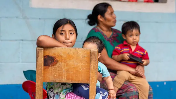Juana, 9, photographed with her mother and siblings at a shelter in Campur, San Pedro Carchá, Alta Verapaz, Guatemala.