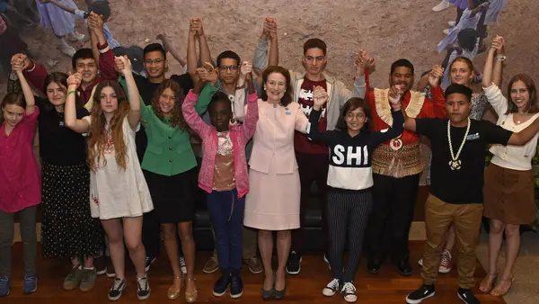 On 23 September 2019, UNICEF Executive Director Henrietta Fore joins hands with youth climate activists, prior to a dialogue at UNICEF House in New York City.