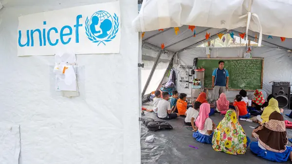 On September 16, 2019, in Maguindanao, Mindanao, the Philippines, children learn in a new high-performance UNICEF tent that makes up part of Kulasi Elementary School.