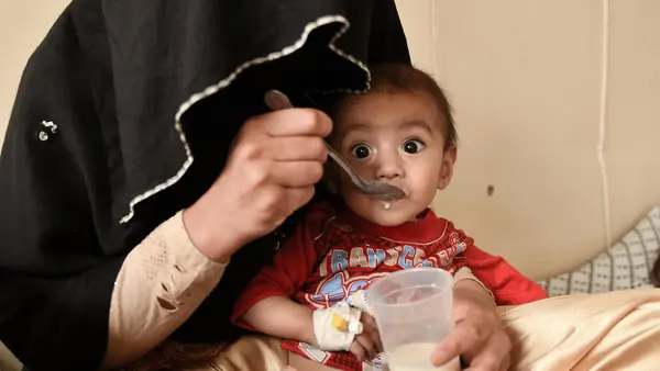A mother gives milk to her baby in the Kisham hospital of the Kishim district, Badakhshan province in the Northeast of Afghanistan.