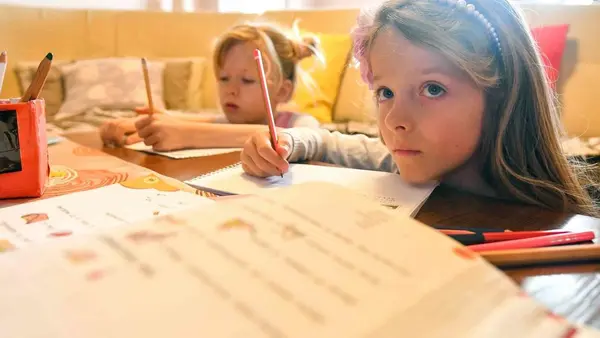 Ana and Kaja, 7-year-old twins from North Macedonia, have been learning at home since the government temporarily closed all schools in response to the spread of COVID-19.