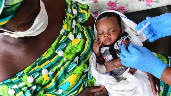 A baby is vaccinated at a UNICEF supported health center outside Abidjan, Côte d'Ivoire.