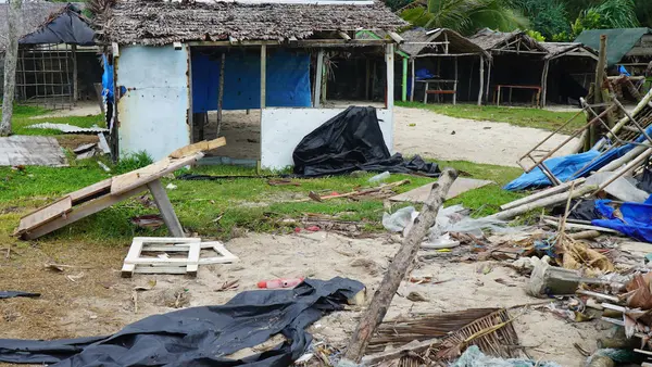 Badly damaged buildings are pictured near Vanuatu's capital of Port Vila on April 7, 2020, after Tropical Cyclone Harold swept past and hit islands to the north. 