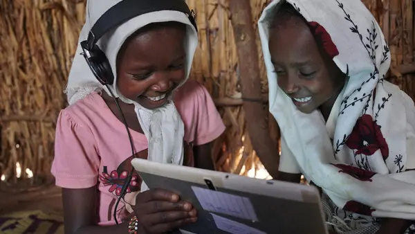 Children use their tablet and work with each other at the UNICEF supported Debate e-Learning Center in a village on the outskirts of Kassala, the capital of the state of Kassala in Eastern Sudan.