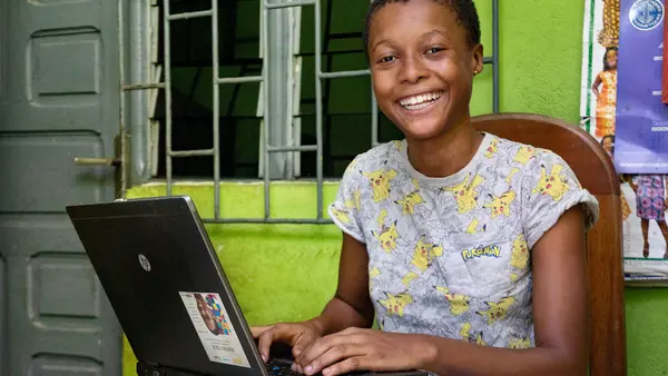 With an internet connection at home in Yopougon, a suburb of Abidjan, Côte d'Ivoire, Tchétché, 16, is able to participate in women's leadership training online during the COVID-19 pandemic.